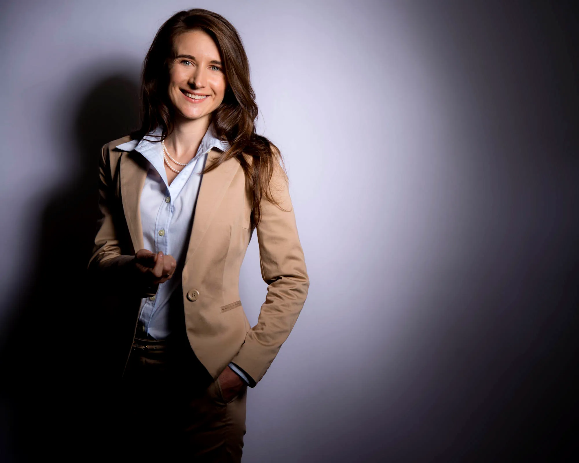 The same businesswoman beginning to relax and smile during the session